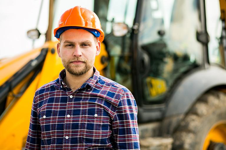 construction worker with a yellow hard hat