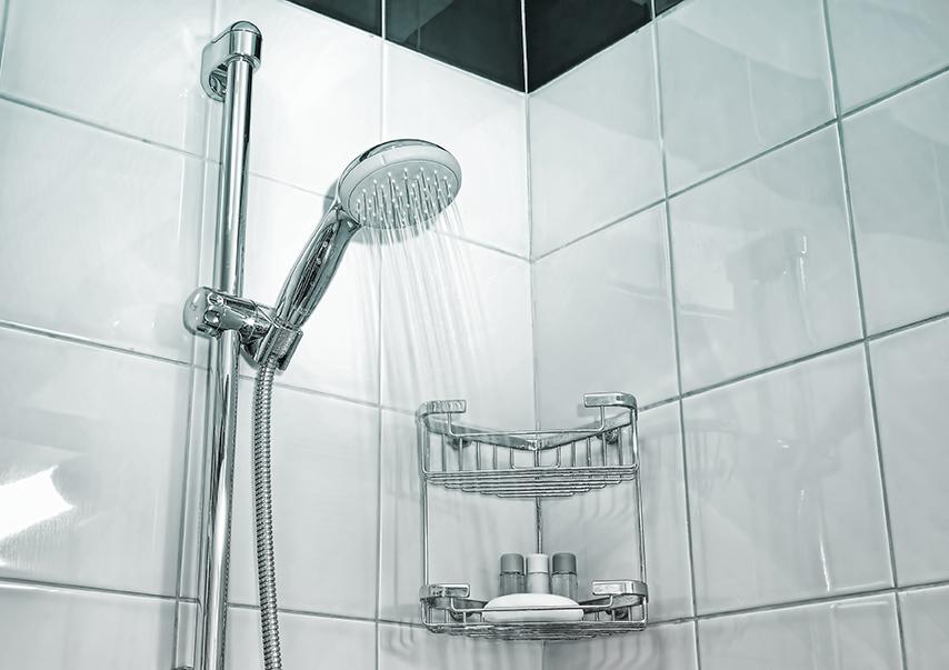 shower with a shower head pouring water